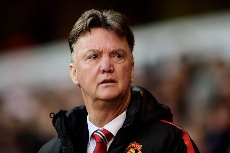 Manchester United manager Louis van Gaal observes his side during their 0-0 draw with Tottenham in the Premier League on Sunday. Jamie McDonald / Getty Images / December 28, 2014 