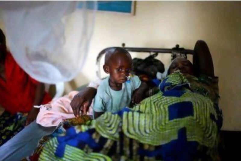 Thomas Medishimiye, 2, with his mother at Rutshuru hospital. Most of the newly injured in Congo's latest eastern rebellion are, for the first time, civilians, and the majority are women and children.