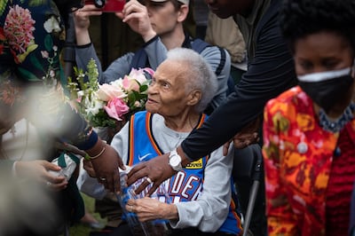 Survivor Viola Fletcher attends a soil dedication ceremony for victims of the 1921 Tulsa Massacre in Tulsa, Oklahoma, U.S., on Monday, May 31, 2021. The Tulsa Race Massacre took place 100 years ago today. From May 31 to June 1, 1921, white people — many of them law enforcement — shot up, bombed and burned down the dozens of Black-owned businesses and hundreds of Black homes that made up Greenwood, killing nearly 300 Black residents and injuring and displacing thousands more. Photographer: Christian Monterrosa/Bloomberg