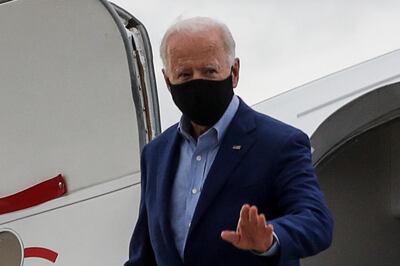 Democratic U.S. presidential nominee Joe Biden disembarks from his campaign plane as he arrives for his first presidential debate with U.S. President Donald Trump at Cleveland Hopkins International Airport in Cleveland, Ohio, U.S., September 29, 2020. REUTERS/Mike Segar