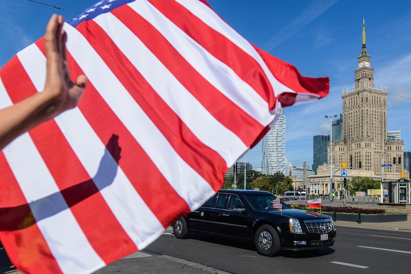 President Donald Trump in "The Beast", the presidential Cadillac limousine in Warsaw in 2017. EPA