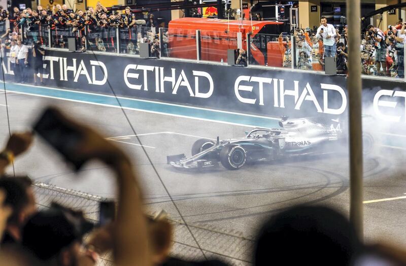 Abu Dhabi, United Arab Emirates, December 1, 2019.  
Formula 1 Etihad Airways Abu Dhabi Grand Prix.
--   Lewis Hamilton (Mercedes)   makes a burnout victory after taking the World Championship Formula1 title.
Victor Besa / The National
Section:  SP
Reporter:  Simon Wilgress-Pipe