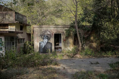 *** EXCLUSIVE ***

RISHIKESH, INDIA - MARCH 21, 2016: Painting of Maharishi Mahesh Yogi, on March 21, 2016 in Rishikesh, Uttarakhand, India.

AN abandoned Hindu monastery that was once home to the Beatles has become a place of pilgrimage for music fans and yogis seeking enlightenment. The ashram in Rishikesh, India, is located in the foothills of the Himalayas, an area known as the Yoga Capital of the World. Seen as a holy city by Hindus, Rishikesh has been a place of worship for centuries and gets visitors from all around the world coming to see the numerous temples and monasteries. During her time travelling through the holy sites, British photographer Kashfi Halford, 39, visited an ashram that once belonged to Maharishi Mahesh Yogi, a spiritual leader to both the Beatles and The Beach Boys.

PHOTOGRAPH BY Kashfi Halford / Bacroft Images / Getty Images

London-T:+44 207 033 1031 E:hello@barcroftmedia.com -
New York-T:+1 212 796 2458 E:hello@barcroftusa.com -
New Delhi-T:+91 11 4053 2429 E:hello@barcroftindia.com www.barcroftmedia.com (Photo credit should read Kashfi Halford / Bacroft Images / Barcroft Media via Getty Images)