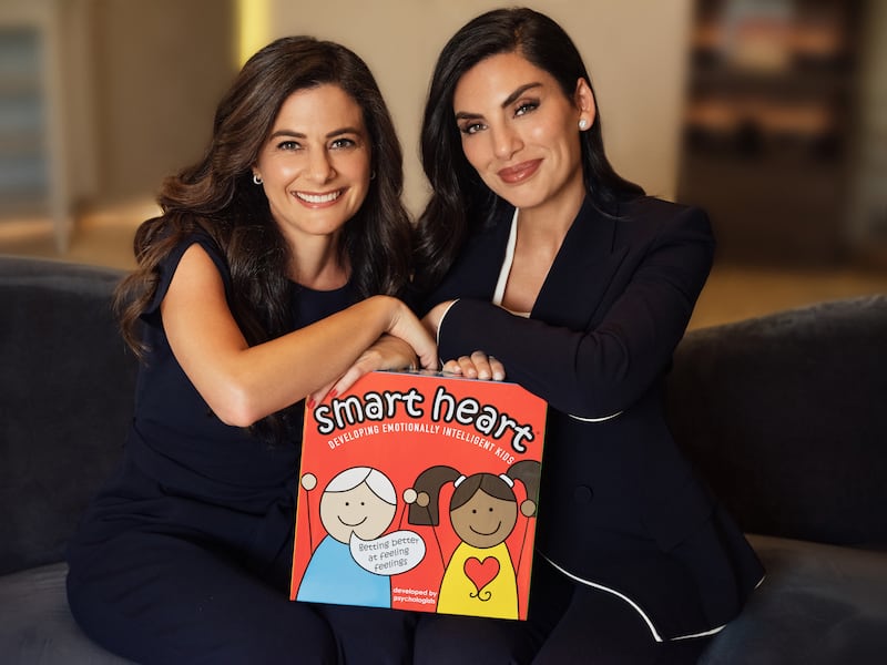 Smart Heart, by Christine Kritzas, left, and Dr Saliha Afridi is a board game that seeks to develop emotional intelligence and strengthen the connection between parents and their children