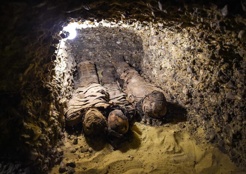 Newly-discovered mummies wrapped in linen found in burial chambers at the necropolis of Tuna el-Gebel, Egypt. AFP