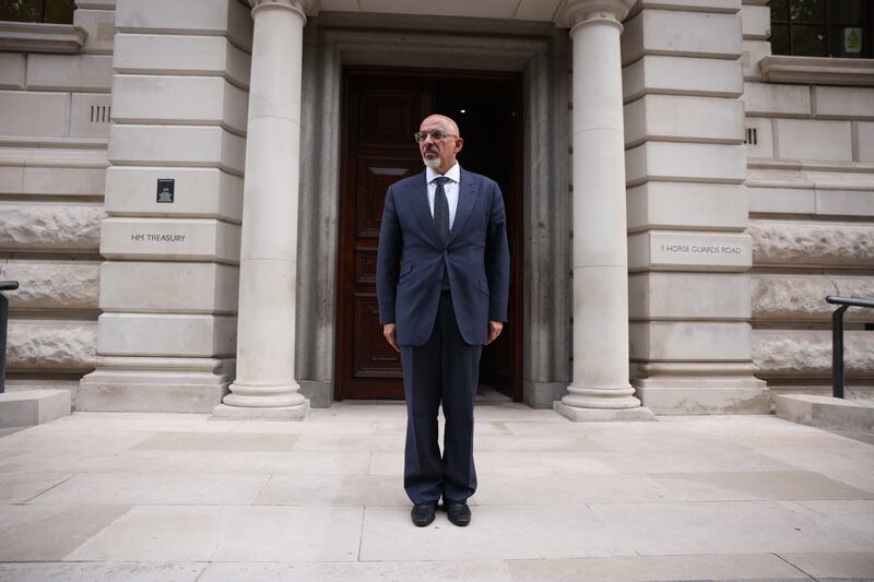 Mr Zahawi says he is proud of his rise from a boy who fled his homeland of Iraq to become a leading contender for prime minister in the UK Conservative leadership race. Getty Images