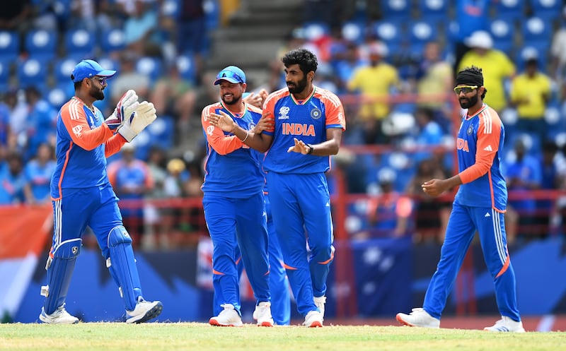 Jasprit Bumrah of India celebrates with teammates after dismissing Travis Head of Australia during their 24-run T20 Cricket World Cup Super Eight win at the Daren Sammy National Cricket Stadium in St Lucia on June 24, 2024. Getty Images