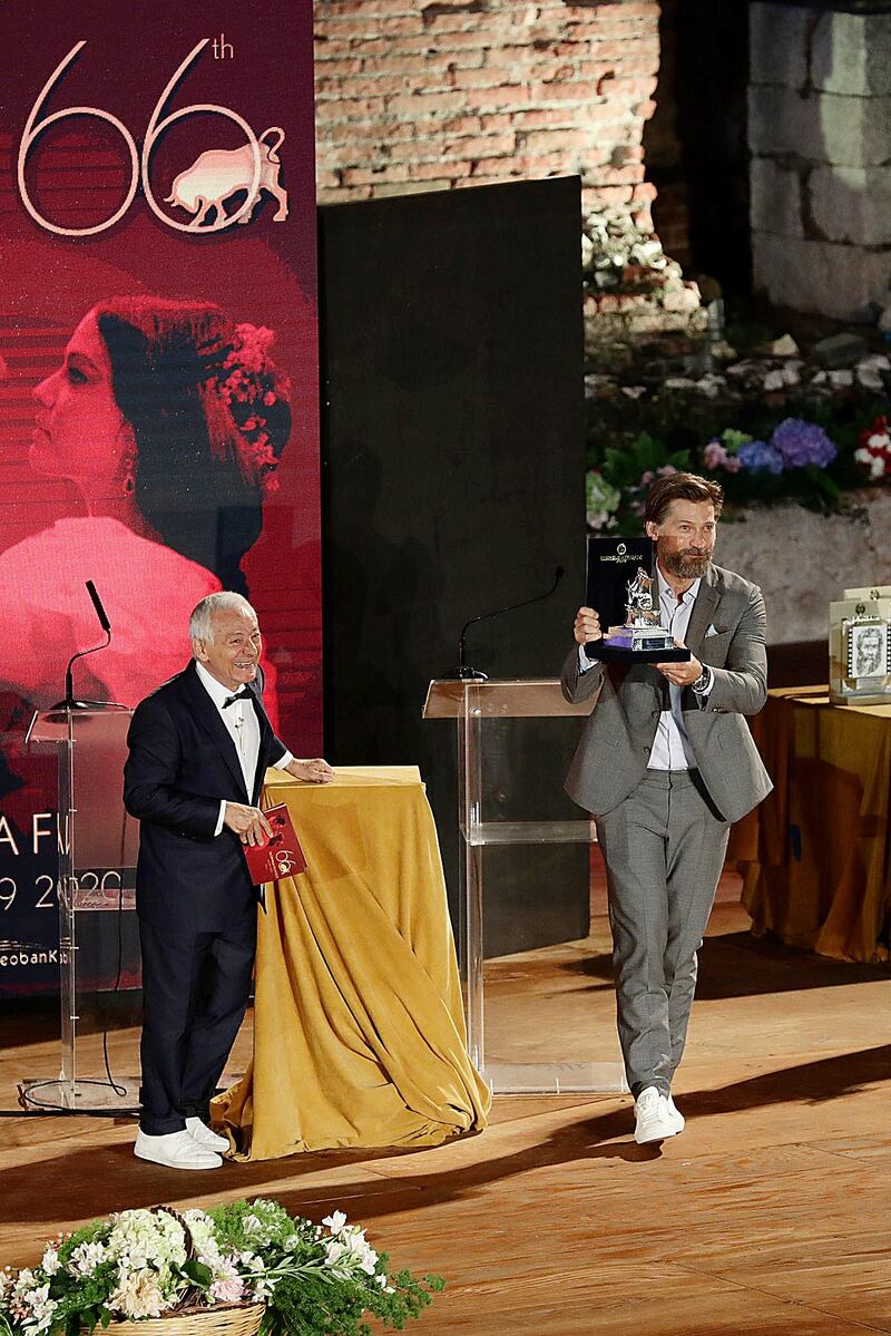 Nikolaj Coster-Waldau picks up his award on stage. Getty Images