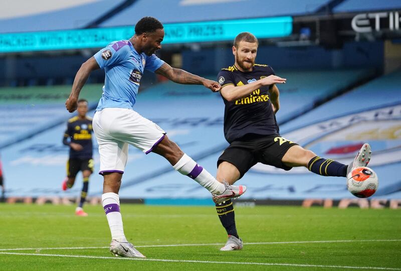 Manchester City's Raheem Sterling scores their first goal. Reuters