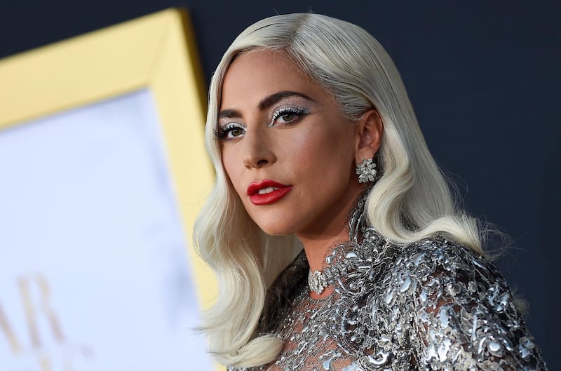 (FILES) In this file photo taken on September 24, 2018 Singer/actress Lady Gaga attends the premiere of "A star is born" at the Shrine Auditorium in Los Angeles. US singer Lady Gaga said in a documentary out Friday that she was raped by a music producer and became pregnant at age 19, an ordeal that eventually caused her to have a "total psychotic break." / AFP / VALERIE MACON
