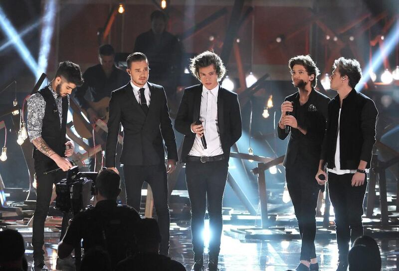 One Direction perform onstage during the 2013 American Music Awards. AFP