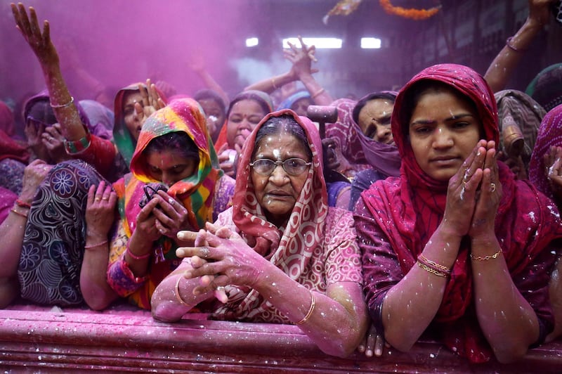 Women offer prayers in Ahmedabad. Amit Dave / Reuters