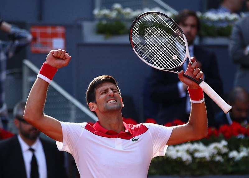 MADRID, SPAIN - MAY 07:  Novak Djokovic of Serbia celebrates to the crowd after his straight sets victory against Kei Nishikori of Japan in their first round match during day three of the Mutua Madrid Open tennis tournament at the Caja Magica on May 7, 2018 in Madrid, Spain.  (Photo by Clive Brunskill/Getty Images)