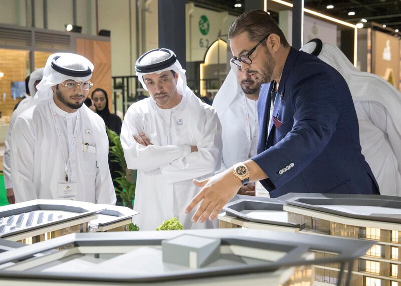 ABU DHABI, UNITED ARAB EMIRATES - April 16, 2019: HH Sheikh Hazza bin Zayed Al Nahyan, Vice Chairman of the Abu Dhabi Executive Council (2nd L), attends the opening of Cityscape Abu Dhabi, at Abu Dhabi National Exhibition Centre (ADNEC). 

( Mohammed Al Blooshi for Ministry of Presidential Affairs )
---