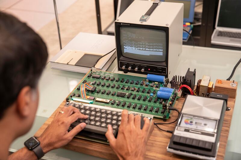 Mr Grewal demonstrates an Apple Computer 1, one of two that he owns.