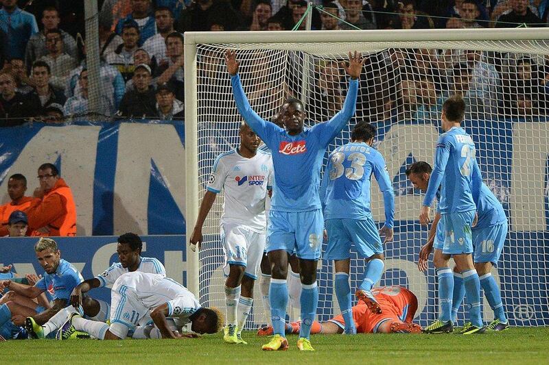 Marseille 1-2 Napoli. Duvan Zapata, center, scored Napoli's second goal as the Serie A side ket pace with Arsenal and Dortmund in Group F. Boris Horvat / AFP