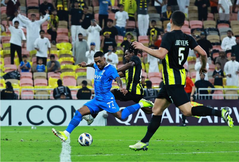 Malcom shoots to score Al Hilal's second goal against Al Ittihad. Reuters