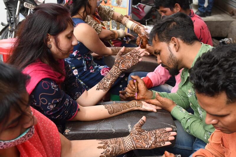 Preparations on the eve of the Karva Chauth festival. AFP