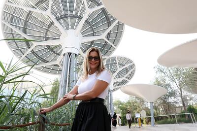 Elisa Ruggeri surrounded by the energy trees at the Sustainability pavilion at Expo 2020 Dubai. Pawan Singh / The National