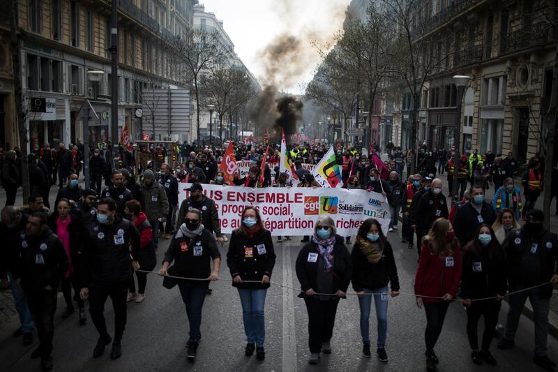 Protesters march during a demonstration in Marseille, southern France. AP Photo