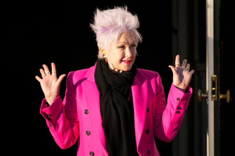Singer Cyndi Lauper arrives to perform during the bill-signing ceremony. AP