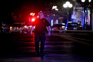 Authorities work at the scene of a mass shooting on Sunday, Aug. 4, 2019, in Dayton, Ohio. AP Photo