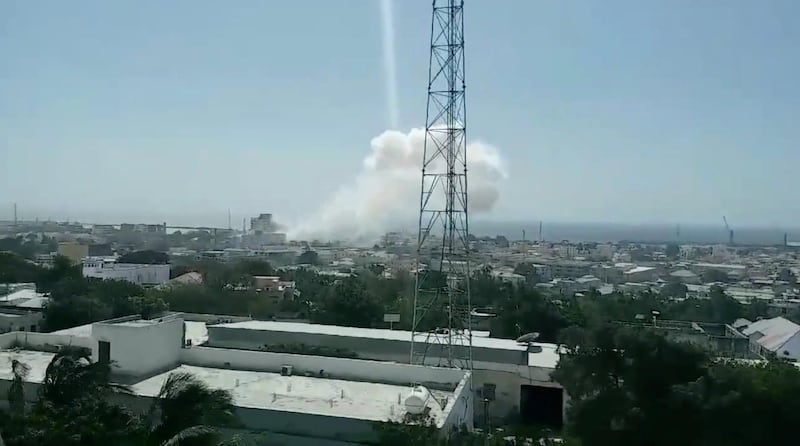 Smoke rises after an explosion in Mogadishu, Somalia February 4, 2019 in this video screen grab taken from social media. Ali Abdirahman/via REUTERS   ATTENTION EDITORS - THIS IMAGE WAS PROVIDED BY A THIRD PARTY. NO RESALES. NO ARCHIVES. MANDATORY CREDIT.