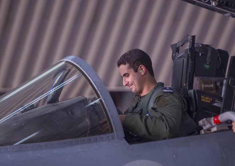 Air force pilot Prince Khaled bin Salman, a son of Crown Prince Salman bin Abdulaziz Al Saud, sits in the cockpit of a fighter jet at an undisclosed location after returning from a mission to Syria. Courtesy Saudi Press Agency/AFP Photo