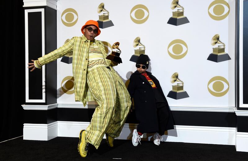 Anderson .Paak celebrating his best rap performance win with son Soul Rasheed. AP
