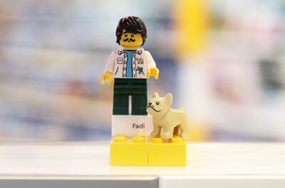 Lego figurines at the new Lego store in The Dubai Mall can be personalised with fonts, pets and more. Photo: Pawan Singh / The National