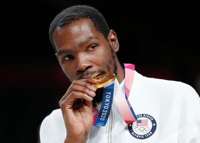 Gold medalist Kevin Durant celebrates on the podium during the men's basketball award ceremony at the Tokyo 2020 Olympic Games. His investment in expense management platform Jeeves has increased in value after the start-up raised $57m in a Series B funding round. EPA 