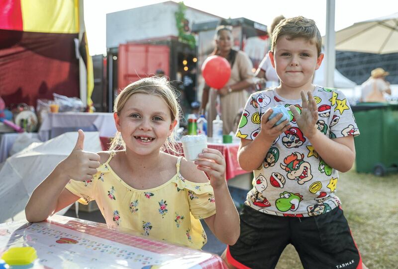 Abu Dhabi, United Arab Emirates, November 9, 2019.  
Taste of Abu Dhabi at the Du Arena.  
Rosie Sutherland and brother Tommy at the "slime" play areaat the fair.
Victor Besa/The National
Section:  NA
Reporter: