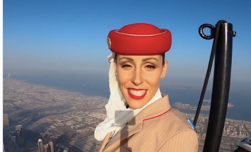 In the new footage, skydiver and stuntwoman Nicole Smith-Ludvik says that she is 'on top of the world', filming atop the Burj Khalifa.