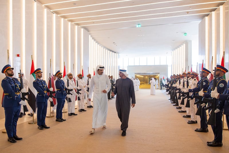 Sheikh Mohamed receives Sheikh Tamim at the airport. Photo: Ryan Carter / UAE Presidential Court