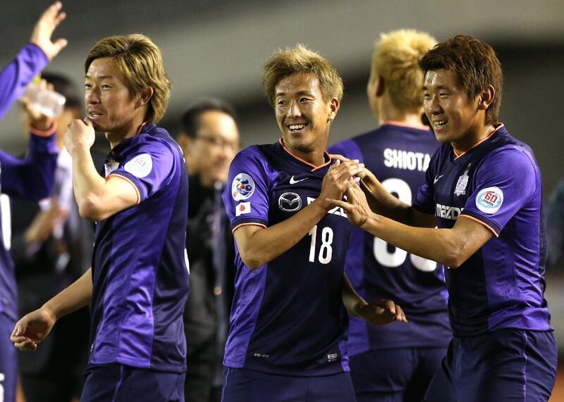 Japan's Sanfrecce Hiroshima players celebrate their victory over Australia's Western Sydney Wanderers in Hiroshima. AFP