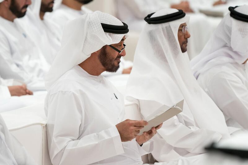 ABU DHABI, UNITED ARAB EMIRATES - May 23, 2018: HH Sheikh Mohamed bin Zayed Al Nahyan, Crown Prince of Abu Dhabi and Deputy Supreme Commander of the UAE Armed Forces (L) attends a lecture by Angela Duckworth, titled ‘True Grit: The Surprising, and Inspiring Science of Success’, at Majlis Mohamed bin Zayed. Seen with HH Sheikh Fahim bin Sultan Al Qasimi (2nd L).
 ( Mohamed Al Hammadi / Crown Prince Court - Abu Dhabi )
---