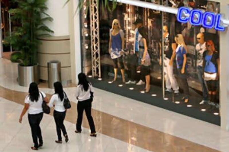 Women shop in the Al Wahda mall on April 22 2008.