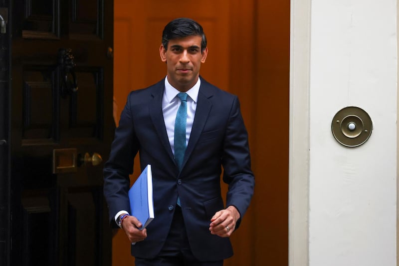 FILE PHOTO: Britain's Chancellor of the Exchequer Rishi Sunak leaves Downing Street, in London, Britain, November 25, 2020. REUTERS/Simon Dawson/File Photo