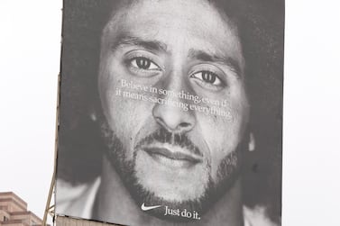 A Nike billboard featuring an image of NFL quarterback Colin Kaepernick is seen near Union Square in San Francisco, California. Nike announced Kaepernick as the face of its new 'Just Do It' ad campaign which has led to public reaction in both directions and an initial impact on the company's stock value. EPA