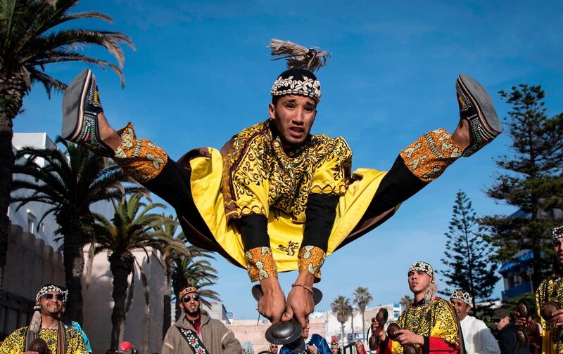 A Gnawa traditional group performs in the city of Essaouira, Morocco, to celebrate the decision to add the Gnawa culture to UNESCO's list of Intangible Cultural Heritage of Humanity. AFP