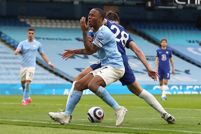 City's Raheem Sterling reacts to a challenge from Cesar Azpilicueta of Chelsea. Reuters