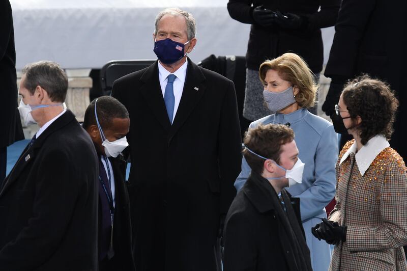 Former US president George W Bush and wife Laura Bush arrive for the inauguration of Joe Biden as the 46th US President. AFP