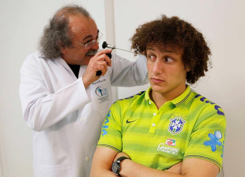 Handout picture released by the Brazilian Football Confederation, showing Brazilian national football team player David Luiz, undergoing a medical check-up ahead of the 2014 World Cup on Monday. Rafael Ribeiro / Getty Images / CBF / May 26, 2014