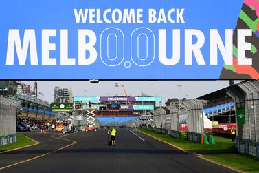 A welcome back Melbourne sign sits above pit straight at the Albert Park Circuit in Melbourne on April 6, 2022, ahead of the 2022 Formula One Australian Grand Prix.  (Photo by William WEST  /  AFP)  /  -- IMAGE RESTRICTED TO EDITORIAL USE - STRICTLY NO COMMERCIAL USE --