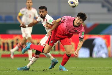 Soccer Football - World Cup - Asian Qualifiers - Group A - United Arab Emirates v South Korea - Al-Maktoum Stadium, Dubai, United Arab Emirates - March 29, 2022  South Korea's Min-Jae Kim in action with United Arab Emirates' Harib Abdalla Suhail  REUTERS / Stringer