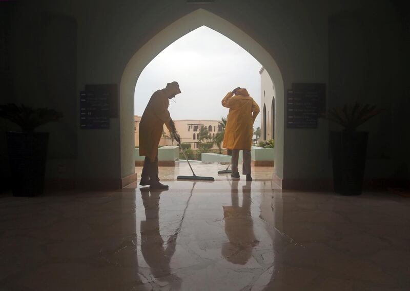 Staff members removes the rain water covered a corridor at a hotel in Salalah, Oman. Cyclone Mekunu will be "extremely severe" when it crashes into the Arabian Peninsula.  Kamran Jebreili / AP Photo