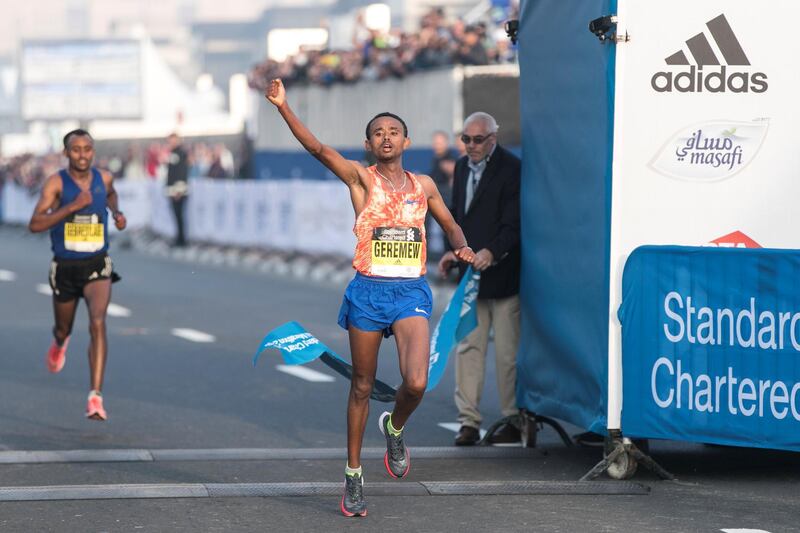 DUBAI, UNITED ARAB EMIRATES - Jan 26, 2018. 

Mosinet Geremew led an Ethiopian sweep of the top 10 in the Dubai Marathon in a new course record time of 2 hours and 4 minutes on Friday morning at the Standard Chartered Dubai Marathon. 

(Photo by Reem Mohammed/The National)

Reporter: Amith
Section: NA + SP