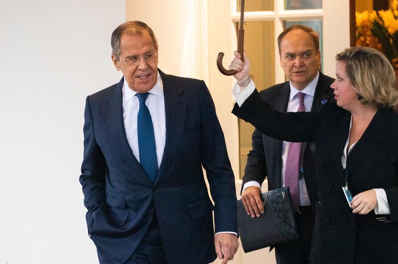 Russian Foreign Minister Sergey Lavrov, left, leaves the White House following a meeting with President Donald Trump, Tuesday, Dec. 10, 2019, in Washington. (AP Photo/Manuel Balce Ceneta)