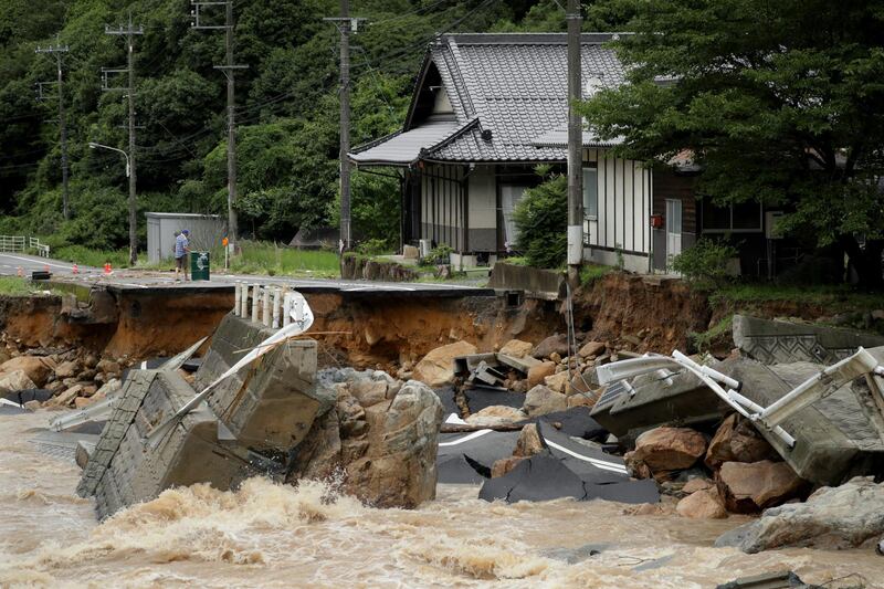 A road is destroyed due to heavy train in Higashihiroshima, Hiroshima Prefecture, Japan. EPA