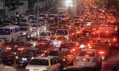 A general view of the traffic on a crowded road in Cairo October 26, 2010. Smog-ridden Cairo's gridlock shows investment in roads, railways and ports is failing to keep pace with economic growth, menacing public health and threatening economic asphyxiation. Around 12,000 deaths occur every year in Egypt because of road accidents, the highest rate in the world per head of population bar Eritrea and the Cook Islands, according to the World Health Organization's most recent report in 2009. The capital's congested roads come to a standstill daily as infrastructure fails to support population growth of 2 percent a year and as thousands of new cars hit the streets every year. Picture taken October 26, 2010. To match Feature EGYPT-BUSINESS/       REUTERS/Mohamed Abd El-Ghany (EGYPT - Tags: BUSINESS SOCIETY TRANSPORT)